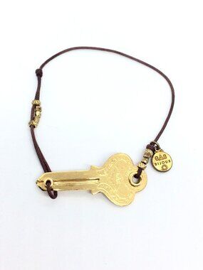 GAS BIJOUX Key Bracelet Gold Tone France Cord Adjustable Charm Designer